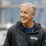 Seahawks head coach Pete Carroll smiles as he watches drills during rookie minicamp May 12, 2017, in Seattle. (AP Photo/Ted S. Warren)