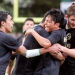 Lynnwood&rsquo;s Patrick Kreider (front right) celebrates his match-tying goal with his teammates during the Royals&rsquo; 4-1 win over Snohomish for the 3A District 1 championship Saturday in Shoreline. (Kevin Clark / The Herald)