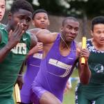 From left to right, Shorecrest&rsquo;s Cyrus McAllister hands off to Sadath Aboudou, Oak Harbor&rsquo;s Taeson Hardin hands off to Dorian Hardin and Edmonds-Woodway&rsquo;s Chris Tilbury hands off to Zach Krumroy in the 4x100 relay during the 3A District 1 track and field championships on May 19, 2017, at Shoreline Stadium. (Kevin Clark / The Herald)