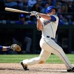 Seattle&rsquo;s Kyle Seager and Texas Rangers catcher Jonathan Lucroy watch the path of Seager&rsquo;s solo home run in the eighth inning of Sunday&rsquo;s game at Safeco Field. (AP Photo / Elaine Thompson)