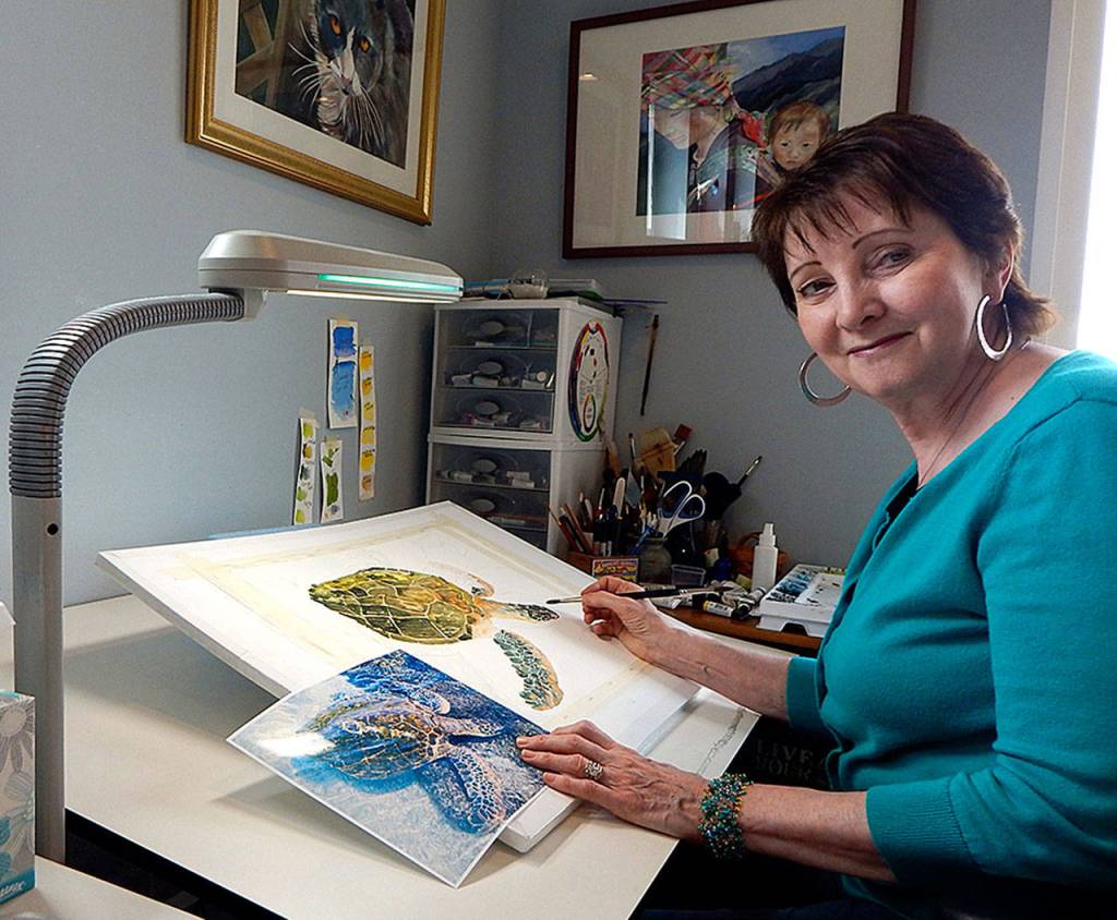 Gale Fiege / The Herald Nicki Wight at work in her studio on Camano Island.