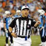 In this Aug. 27, 2011, file photo, referee Alberto Riveron makes a call in the second quarter of an NFL preseason game between the Chicago Bears and the Tennessee Titans in Nashville, Tennessee. The NFL has promoted Riveron to its head of officiating. (AP Photo/Frederick Breedon, File)