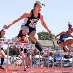 Arlington&rsquo;s Sidney Trinidad, left, and Leahi Manthei of Gig Harbor race through the 300 meter hurdles during 3A state track championship Friday afternoon at Mt. Tahoma High School on May 27, 2017. Trinidad took second. (Kevin Clark / The Herald)