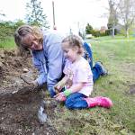 Danielle and Leena Endecott prepare the ground at a tree-planting event at Alderwood Early Childhood Center. (Contributed photo)