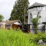 The odd-shaped gray house has been a Lake Stevens eyesore and icon since 1983. Names it has been called include shipwrecked lighthouse, Darth Vader house, Flintstone house, Dr. Seuss house, Rapunzel&rsquo;s Tower, prison guard tower, Volkswagen bus house and hobbit house. It was recently sold and is going to be demolished. (Kevin Clark / The Herald)