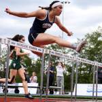 Arlington&rsquo;s Sidney Trinidad takes and holds the lead in the 100-meter hurdles Friday afternoon during the 3A District 1 track and field championships on May 19, 2017, at Shoreline Stadium. (Kevin Clark / The Herald)