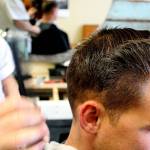 Bell specializes in fade haircuts favored by military members. He also creates &ldquo;rockabilly&rdquo; styles. (Photo by Patricia Guthrie/Whidbey News-Times)