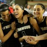 Lynnwood&rsquo;s Abby Yemane (left to right), Lynnwood&rsquo;s Jordyn Edwards and Lynnwood&rsquo;s Kaprice Boston celebrate a playoff win. Edwards improved her grades and SAT score through the Path program. (Kevin Clark / The Herald)
