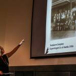 Tsutakawa talks about her family&rsquo;s history in Seattle&rsquo;s &ldquo;Japantown&rdquo; a century ago. Here she displays a photo and talks about her father&rsquo;s Export-Import Company in Seattle during the 1930s. (Dan Bates / The Herald)