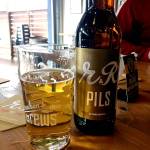 The new r&R Pils will be available in 12-ounce six packs and 22-ounce bottles. (Photo by Aaron Swaney)