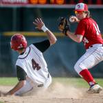 Snohomish&rsquo;s Adam Ivelia (left) is forced out by Marysville Pilchuck&rsquo;s Trevor Anderson in a winner-to-state, loser-out district game on May 10, 2017, at Earl Torgeson Field in Snohomish. (Kevin Clark / The Herald)