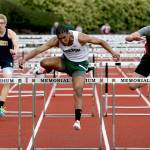 Everett&rsquo;s Michael Neason (left), Jackson&rsquo;s Theo Davis (center) and Cascade&rsquo;s Shulong Mo (right) compete in the 110-meter hurdles at Memorial Stadium in Everett on May 5, 2017. (Kevin Clark / The Herald)