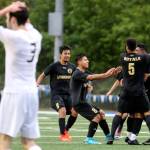 Lynnwood players celebrate a goal during their 4-1 win over Snohomish for the 3A District 1 championship Saturday in Shoreline. (Kevin Clark / The Herald)