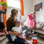 Cousins (from left) Nolah O&rsquo;Brien, Luree Halbach and Anique Sims play with Rachel Halbach, holding her daughter, Alma Halbach. (Kevin Clark / The Herald)