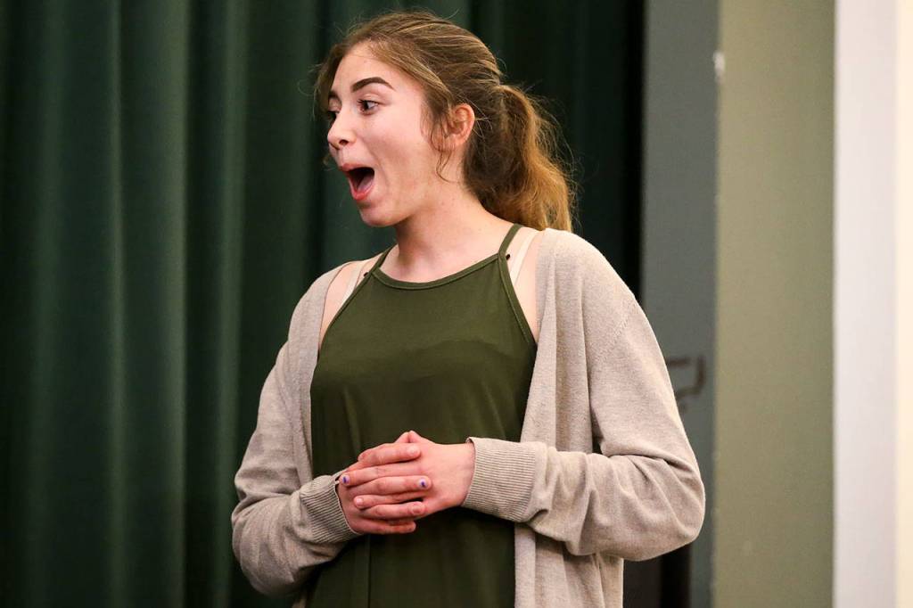Kennedy Lentini reacts to her scholarship amount Wednesday at Marysville Arts & Technology High School. (Kevin Clark / The Herald)