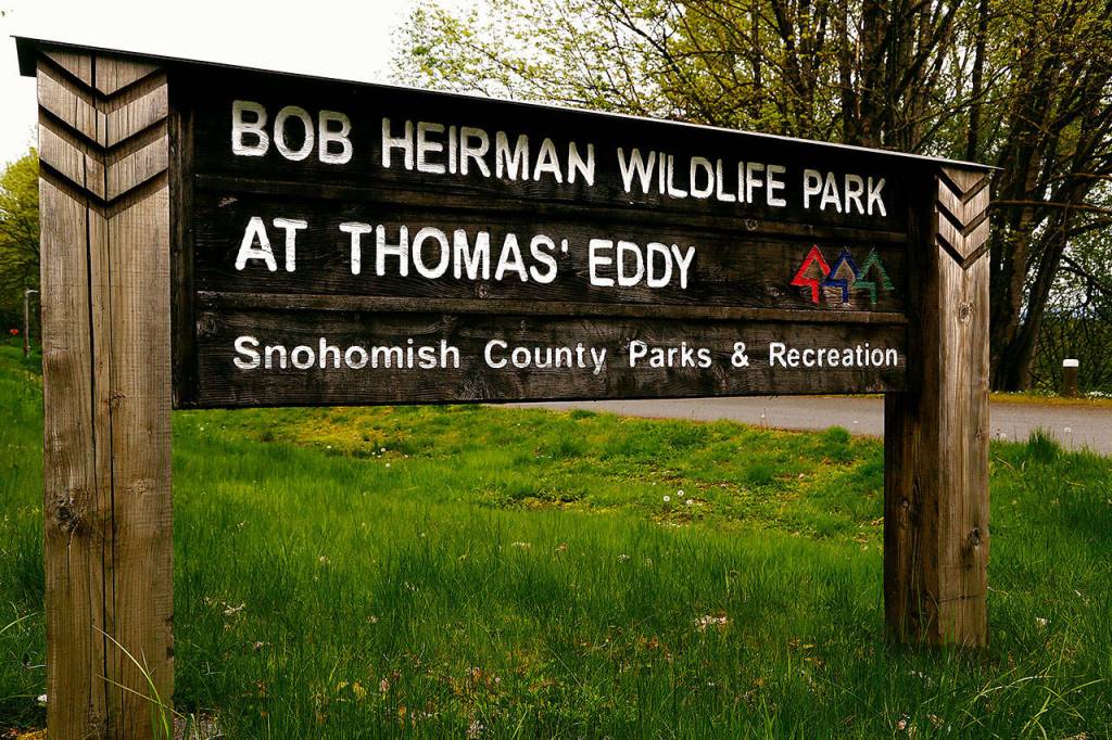 The Bob Heirman Wildlife Park entrance, with picnic tables at the parking lot above the wildlife preserve, is located at 14913 Connelly Road in Snohomish. (Dan Bates / The Herald)