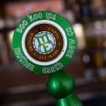 Beer tap handles come be made of all sorts of material including wood or metal like this one. Bothell&rsquo;s Decibel Brewing makes tap handles out of recycled microphones. (Andy Bronson / The Herald)