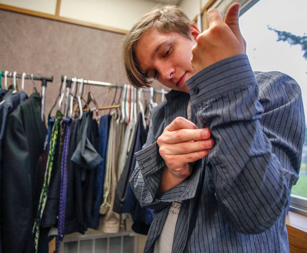Teryn Gurule, 18, tries on formal wear for Friday&rsquo;s prom. (Dan Bates / The Herald)