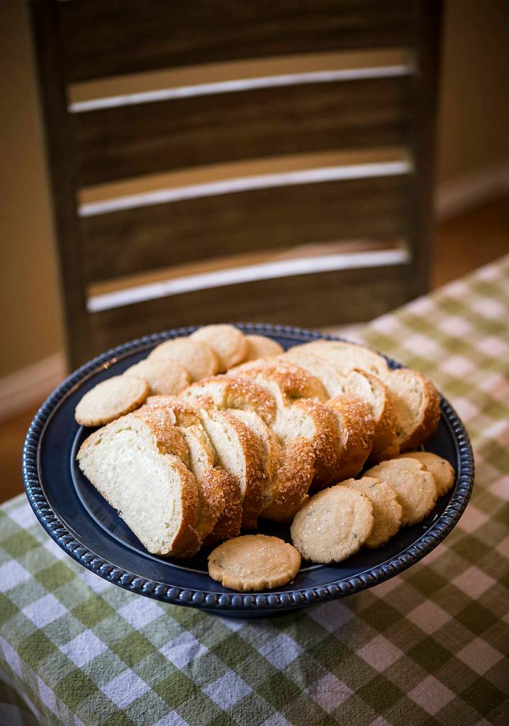 Sliced cardamom bread and lemon-rosemary cookies. (Ian Terry / The Herald)