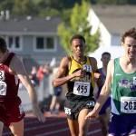 Mount Spokane&rsquo;s Hayden Dressel (left) takes first in front of Edmonds-Woodway&rsquo;s Matthew Park (right) and Lincoln&rsquo;s James Mwaura in the 1,600 meters during the state track and field championships on May 25, 2017, at Mount Tahoma High School. (Kevin Clark / The Herald)