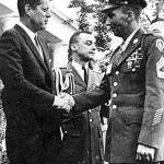 President John F. Kennedy congratulates Wilburn K. Ross. (Wikipedia)