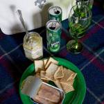 A tin of trout is paired with lemon crackers, a feta and pink peppercorn spread and lime Perrier, part of a picnic basket from Kelly Colman, owner of Proper Picnic. The company sells all you&rsquo;ll need to have a proper picnic. (Andy Bronson / The Herald)
