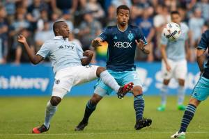 Fernandes scores 3 goals, Sporting KC blanks Sounders 3-0