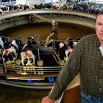 With his rotary parlor, dairy farmer Jeremy Visser is able to milk 60 cows at once in rotation. With 2,000-plus cows, he is producing about 20,000 gallons of milk each day. (Dan Bates / The Herald)