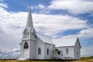 The Sherman Church, surrounded by farm country in Eastern Washington&rsquo;s Lincoln County, is next to the small Sherman Cemetery where Julie Muhlstein&rsquo;s grandmother is buried. The old church still holds a Memorial Day service and gathering every year. (The Wilbur Register photo)