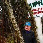 Dick Todd put up a sign trying to slow down traffic along 99th Ave SE in Lake Stevens where it borders his eight acres, but officials took it down. Now he has it wedged between some trees back off the city&rsquo;s right-of-way. Todd is very concerned about the high density housing going up to accommodate growth in the previously rural area. (Dan Bates / The Herald)