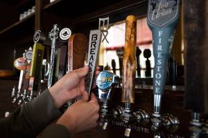 Beer tap handles mix art, creativity and plenty of marketing