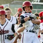 Snohomish&rsquo;s Chase Taylor is lifted by teammate Josh Johnston leading the celebration of their 5-4 win over Marysville Pilchuck at Earl Torgeson Field in Snohomish on May 10. (Kevin Clark / The Herald)