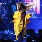 In this Sept. 24, 2016, photo, Ariana Grande performs at the iHeartRadio Music Festival in Las Vegas. (Photo by John Salangsang / Invision)