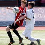 Snohomish&rsquo;s Jason Fairhurst (left) fights for possession of a ball with Gig Harbor&rsquo;s Tyler Meyer during a state 3A semifinal game at Sparks Stadium in Puyallup on May 26. (Ian Terry / The Herald)