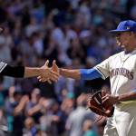 Mariners pitcher Ariel Miranda shares congratulations with catcher Mike Zunino after Sunday&rsquo;s game in Seattle. (AP Photo/Elaine Thompson)