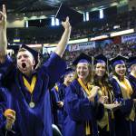 George Spady cheers during the closing of the graduation ceremony of Arlington High School at Xfintiy Arena in Everett on June 12, 2016. (Kevin Clark/Herald file photo)
