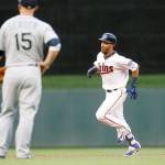Minnesota&rsquo;s Eddie Rosario rounds third base on the second of his three home runs during the Twins&rsquo; 20-7 win over Seattle on Tuesday in Minneapolis. (AP Photo/Jim Mone)