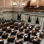 Republican Sen. Joe Fain (standing bottom center) speaks on the Senate floor during adjournment of a second special session on Wednesday, in Olympia. Lawmakers are now in a third special session to complete their work on a two-year state budget. (Rachel La Corte/Associated Press)