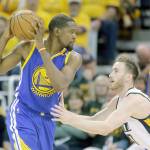 Utah&rsquo;s Gordon Hayward (20) guards Golden State&rsquo;s Kevin Durant (35) during Game 4 of a Western Conference playoff game on May 8 in Salt Lake City. Both Hayward and Durant are officially free agents as of 9 p.m. Friday, but while Durant is widely expected to remain with the Warriors, Hayward may be on the move. (AP Photo/Rick Bowmer)