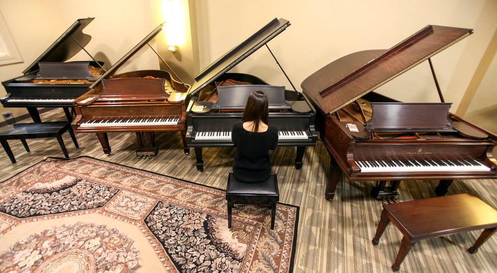 Liv Hwang plays at Boyd&rsquo;s Pianos in Everett on June 11. (Kevin Clark / The Herald)