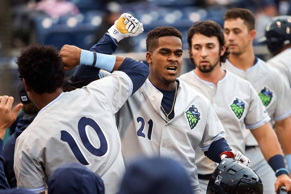 Hillsboro&rsquo;s Domingo Leyba (21) celebrates his 3-run home run in the fifth inning against Everett at Everett Memorial Stadiumon June 15. (Kevin Clark / The Herald)