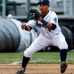 Everett Aquasox third baseman Eugene Helder fields a ball during the Everett Cup exhibition game against the Merchants at Everett Memorial Stadium on June 13. (Ian Terry / The Herald)