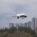 The Boeing 737 MAX 9 completed its first flight April 13. The plane is seen here landing at Boeing Field in Seattle. (Craig Larsen / Boeing Co.)