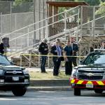 Law enforcement officers investigate the scene of a shooting near a baseball field in Alexandria, Virginia, on Wednesday. House Majority Whip Steve Scalise of Louisiana was among those shot at a baseball practice. (AP Photo/Alex Brandon)