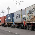 Trucks loaded with containers are lined up outside a terminal at the Jawaharlal Nehru Port Trust in Mumbai, India, on Thursday. Operations at a terminal at India&rsquo;s busiest container port were stalled by the malicious software that suddenly burst across the world&rsquo;s computer screens Tuesday. (AP Photo/Rajanish Kakade)