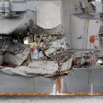 The damaged section of the USS Fitzgerald is seen at the U.S. Naval base in Yokosuka, southwest of Tokyo. (AP Photo/Eugene Hoshiko, File)