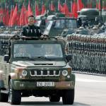 Chinese President Xi Jinping inspects Chinese troops of the People&rsquo;s Liberation Army in Hong Kong on Friday to mark the 20th anniversary of Beijing taking control of the former British colony. (AP Photo/Kin Cheung)