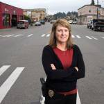 Monroe Police Department&rsquo;s Detective Sgt. Cindy Chessie stands along Main Street on Wednesday in Monroe. Chessie retired Thursday to become director of the Sky Valley Food Bank. (Andy Bronson / The Herald)