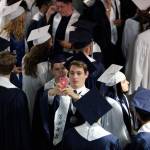 Glacier Peak High School seniors pose for a photo before their graduation ceremony at Xfinity Arena on Monday in Everett. (Andy Bronson / The Herald)