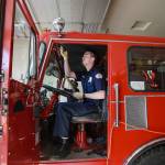 Volunteer firefighter Scott Murphy, of Federal Way, goes through a rig check in 2012 on Hat Island. The Hat Island fire department is entirely staffed by volunteers. The rigs in the fleet date back to the 1980s and earlier. Soon they are getting a 1991 model, formerly used in Machias. (Herald file)
